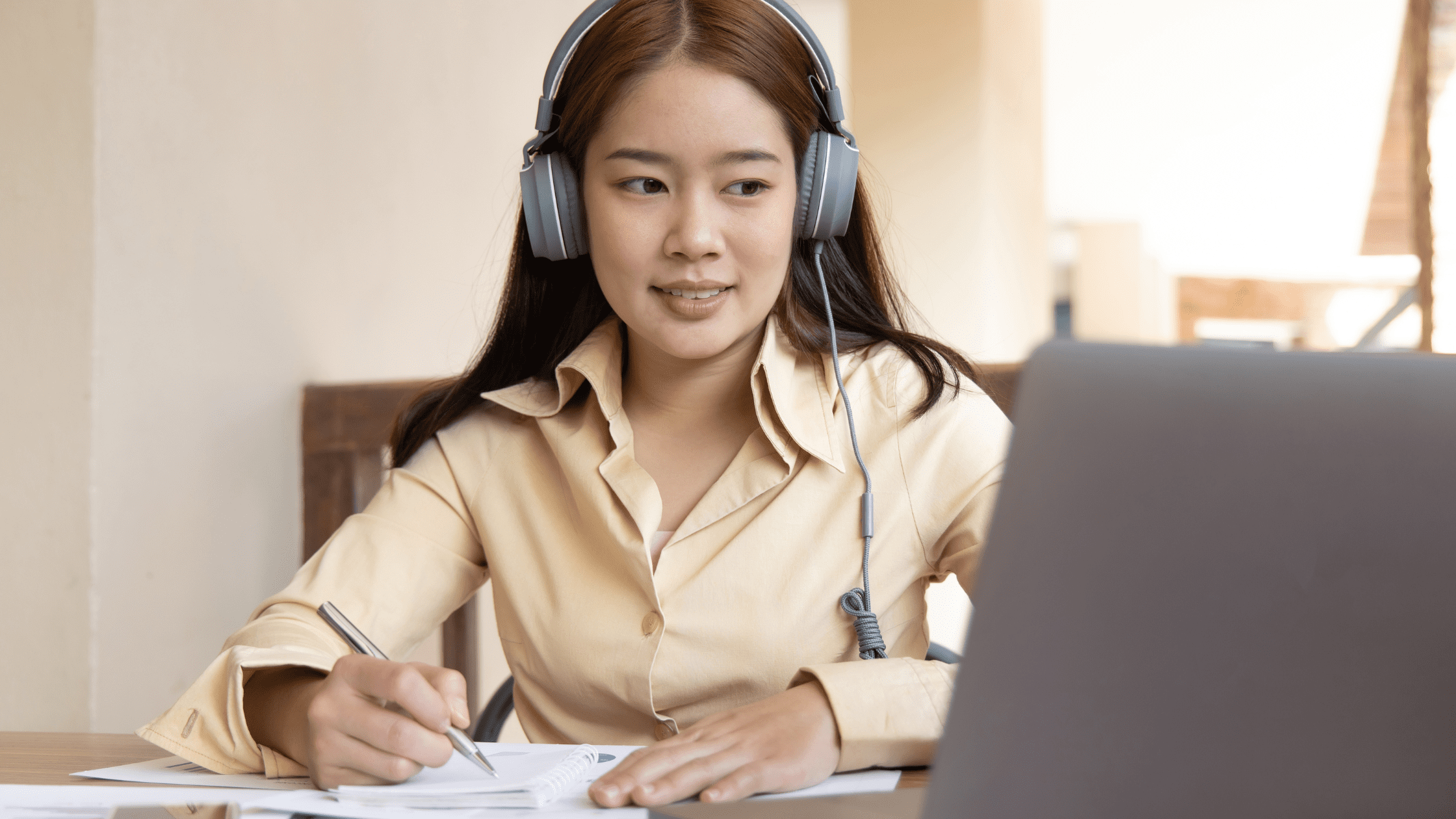 Someone on laptop studying for Neurology Shelf Exam